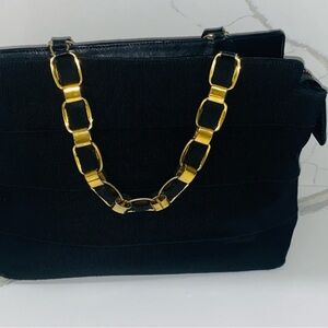 Salvatore Ferragamo Black Bag with Gold Accents